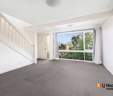 Spacious Two-Bedroom Townhouse in Peaceful, Convenient Location - Photo 1