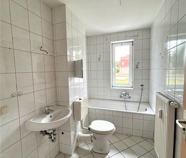 Kleine Familienwohnung mit Garten! - Foto 6