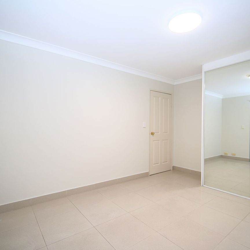 Freshly Painted 2 bedroom unit - Photo 1