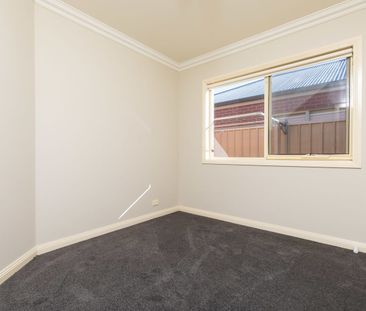 Neat, centrally located townhouse. - Photo 6