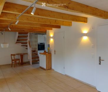 Schöne Dachwohnung in Uzwil mit Aussenparkplatz und Garten - Photo 1
