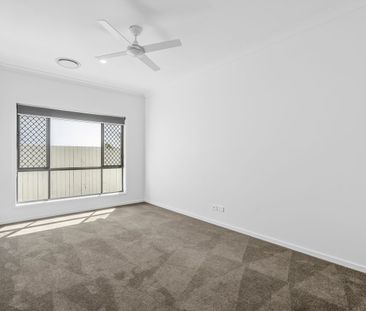 North-Facing Family Home with Ducted Air Conditioning in Coomera - Photo 2