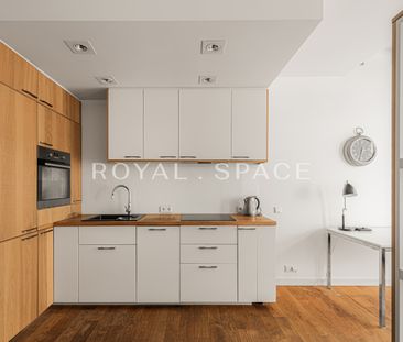 2-poziomowe mieszkanie z prywatną siłownią - Zdjęcie 1