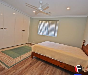 Spacious Furnished Four-Bedroom Home with Study & Ocean Glimpses - Photo 4