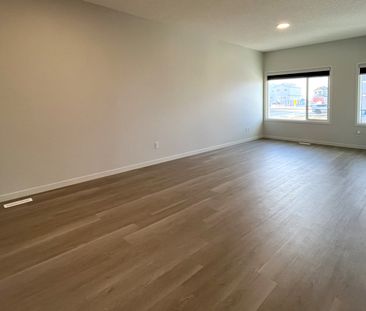 Modern 3 Bed Main Floor With In Suite Laundry - Photo 6