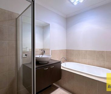 SPACIOUS 4 BEDROOM HOME WITH 2 LIVING AREAS - Photo 1