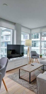 Fully Furnished Modern 2 Bed + 2 Bath + Den @ KENSINGTON GARDENS - Photo 1