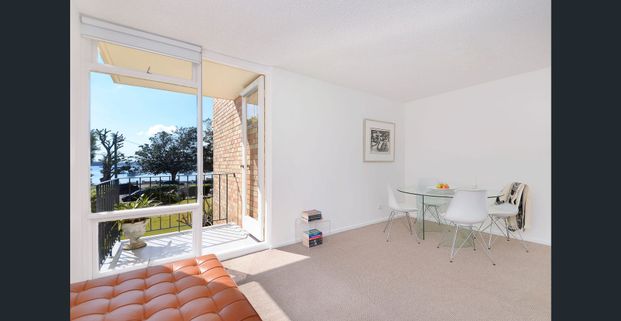 BEACHSIDE LIVING AT ITS BEST! - Photo 1