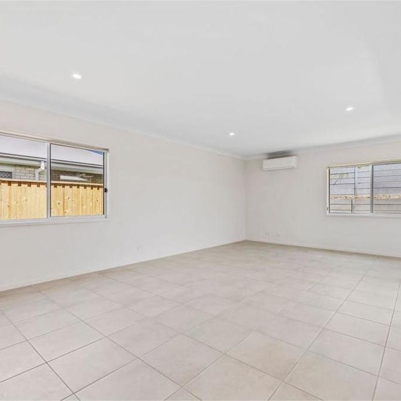 Brand New Contemporary Family Home + FIRST WEEK RENT FREE! - Photo 1