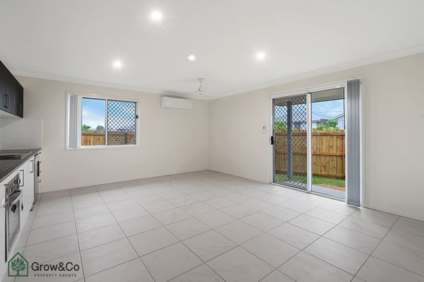 3BED HOME WITH LARGE OPEN PLAN LIVING WITH AIR-CON - Photo 1