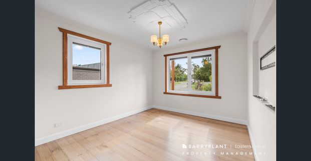 Renovated Charm with Modern Comforts and Sustainable Living - Photo 1