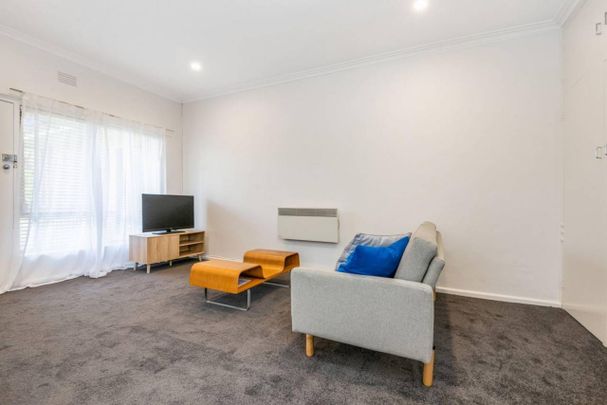 NEAT UNIT IN A GREAT LOCATION! - Photo 1