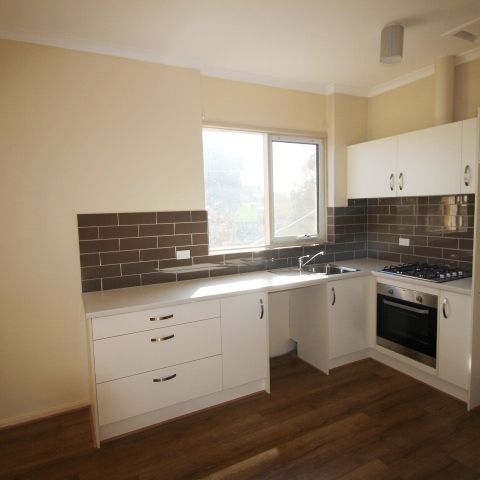 Open the Door to Trendy, Low-Maintenance Living in South Plympton - Photo 1