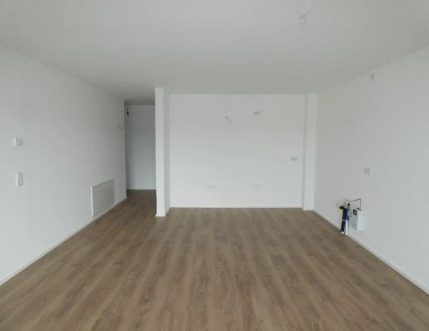 Neubau/Erstbezug: Modern geschnittene 3-Zimmer-Wohnung mit traumhaftem Ausblick - Photo 1