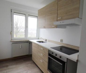 Zweckmäßige 3-Zimmer-Wohnung mit Einbauküche - Foto 1