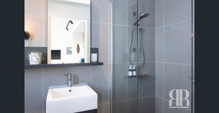 CITY SKYLINE VISIBLE FROM EVERY WINDOW - Photo 5