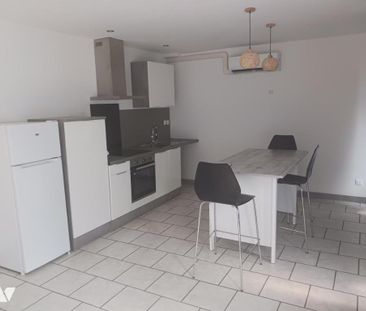 A LOUER T2 MEUBLE AVEC PETIT JARDIN - Photo 2