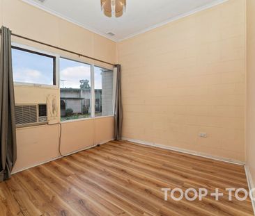 Affordable Two-Bedroom Unit Close to Amenities - Photo 3