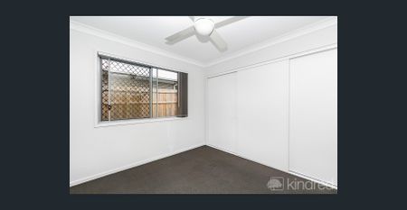 Modern Duplex with Air Conditioning & Secure Yard - In Prime Location - Photo 2