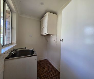 Delightful Family Home in Quiet Taree West Cul-de-Sac - Photo 5