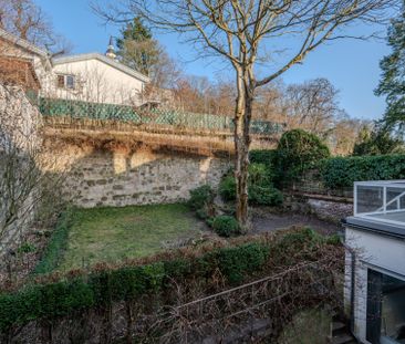 Direkt im Zentrum: 4-Zimmer-Wohnung mit großzügiger Terrasse und vi... - Foto 4