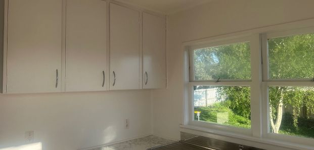 Sunny Top Level 2-bedroom Unit! - Photo 1