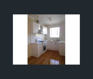 Updated One-Bedroom Villa Unit with Private Courtyard in Prime Cobu... - Photo 3