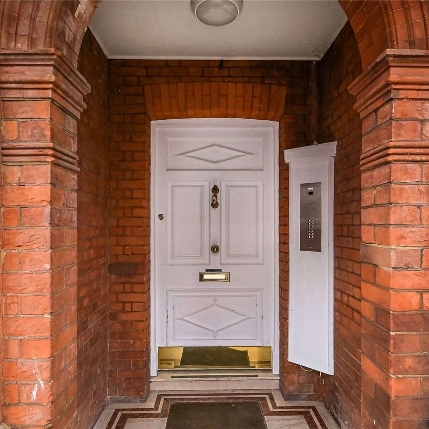 A light and spacious, two-bedroom, two-bathroom apartment situated on the first floor (with lift) of a red brick conversion with eligibility for communal garden access. - Photo 1