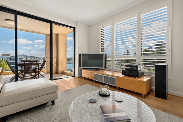 Exquisite Three-Bedroom Apartment within the Prestigious Marina East Complex - Photo 1