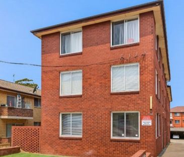 FANTASTIC TOP FLOOR UNIT 500M TO AUBURN STATION - Photo 1