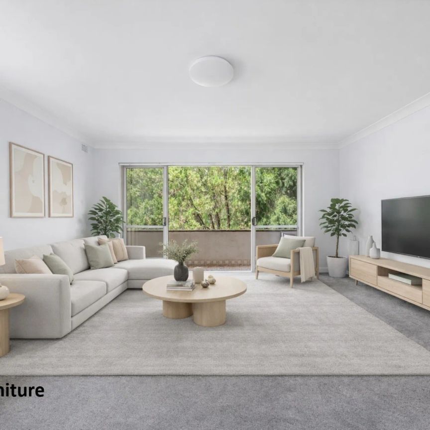 Freshly Renovated Top-Floor Retreat with Exceptional Privacy & Prime Location - Photo 1