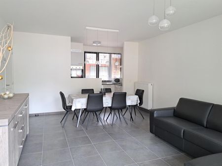 CENTRAAL GELEGEN GELIJKVLOERS APPARTEMENT MET TUINTJE - Photo 2