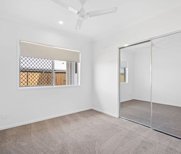 Experience Modern Living in a Brand-New Four-Bedroom Home! - Photo 4