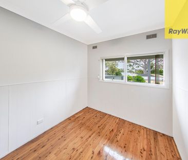 Stunningly Renovated 5-Bedroom Family Oasis with Pool and Garage! - Photo 3