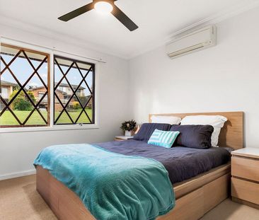 A Beautifully Designed Family Home with Space & Style! - Photo 2