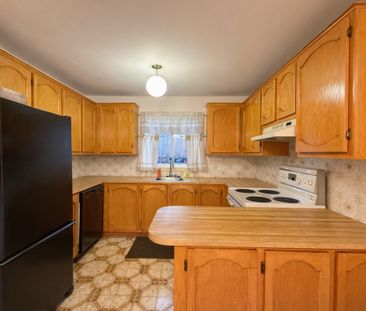 Spacieux appartement de 3 chambres sur deux niveaux, situé au rez-d... - Photo 2