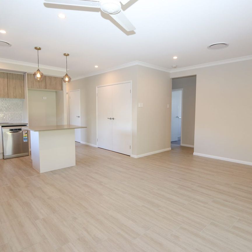 Gorgeous Family Home within Benowa State High School Catchment - Photo 1