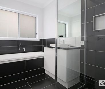 A stunning 4-bedroom, 2-bathroom residence. - Photo 5