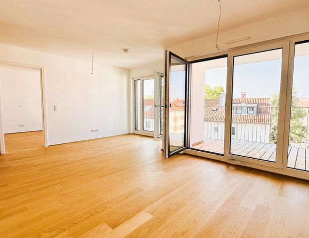 Hoch hinaus in der chicen Stadtwohnung mit sonniger Dachterrasse und Einbauküche! - Photo 1