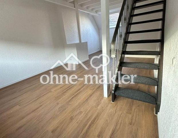 Frisch sanierte Dachgeschosswohnung mit neuer Einbauküche - Foto 1