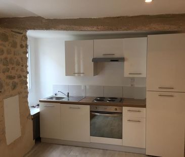 Location - Appartement T2 de 40 m² en rez-de-chaussée d'un immeuble... - Photo 1