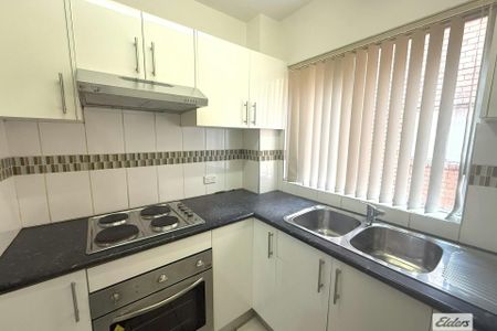 Well Maintained 2 Bedroom Unit! - Photo 3