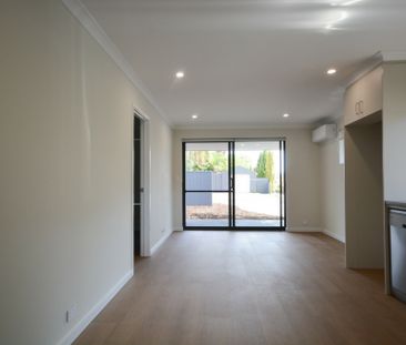 Brand New Three Bedroom Home! - Photo 1