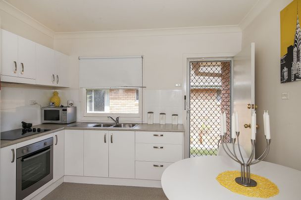 Convenient Villa Living in Quiet Complex of Four - Photo 1