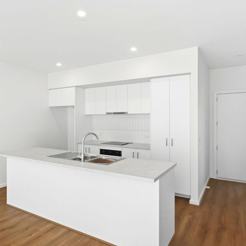 BRAND NEW IN QUALITY CENTRAL LOCATION - Photo 1