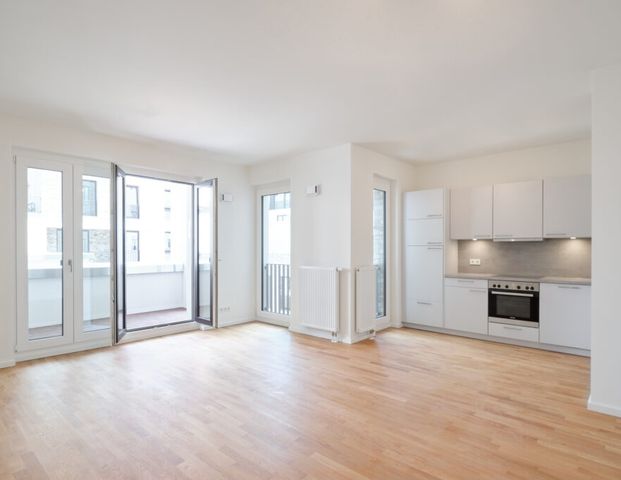 Moderne 2-Zimmerwohnung mit Einbauküche und großzügiger Terrasse. - Foto 1