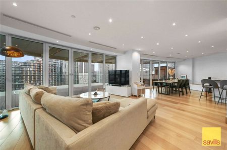 An Impressive apartment of approximately 1,348 sq ft located within just a short distance from Canary Wharf. The property comes with parking, residents gym, pool and concierge. - Photo 3