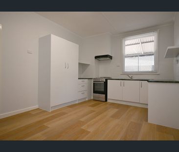 Neat & Freshly Painted 3 bedroom home - Photo 6