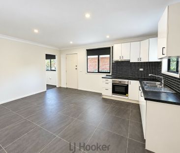 Neat & Tidy 1 Bedroom Unit in Sought After Speers Point - Photo 2