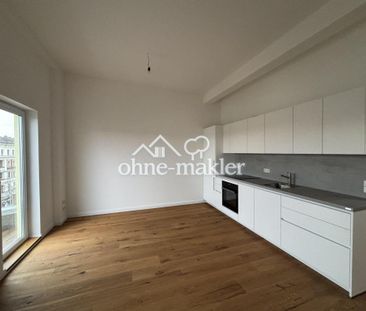 Moderne Neubau-Dachgeschosswohnung in unmittelbarer Nähe zur Schloß... - Photo 2